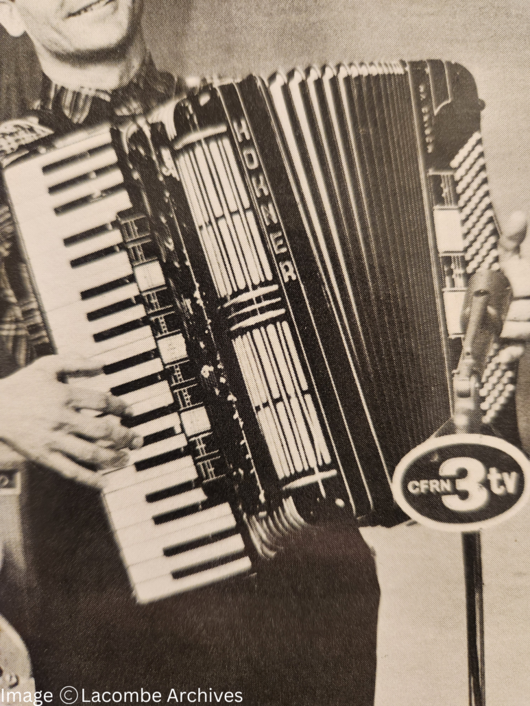 A close up of the Hohner Accordion being played by Gordon Schmitt on album cover